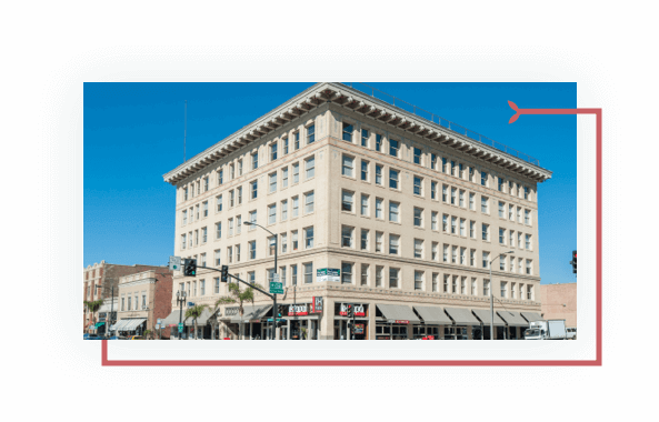 Older stone, light colored, Pasadena Chamber of Commerce building